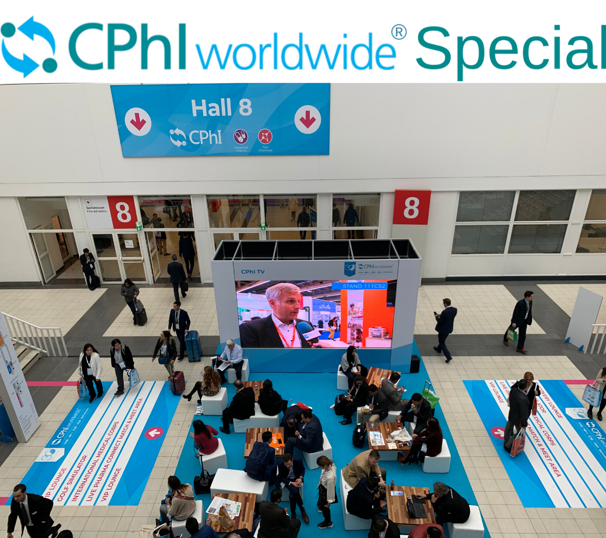 people in front of a big screen at cphi frankfurt